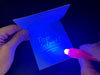 UV-Stift und Notizbuch